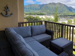 Custom 4 piece sectional with a footrest overlooking the mountains.